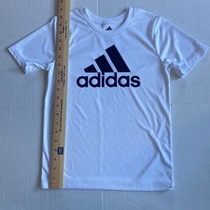 Adidas youth T-shirt white with applied graphic. Youth 7 self-wick fabric.